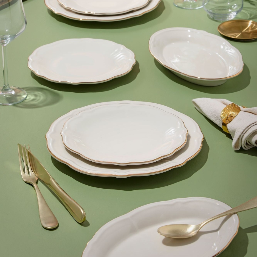 18 daļu porcelāna trauku komplekts — balts ar zelta rotājumu