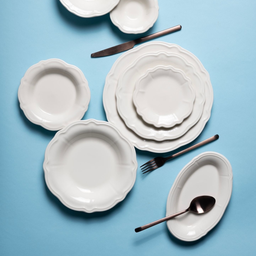 24 gab. eleganta baltā porcelāna galda servīze