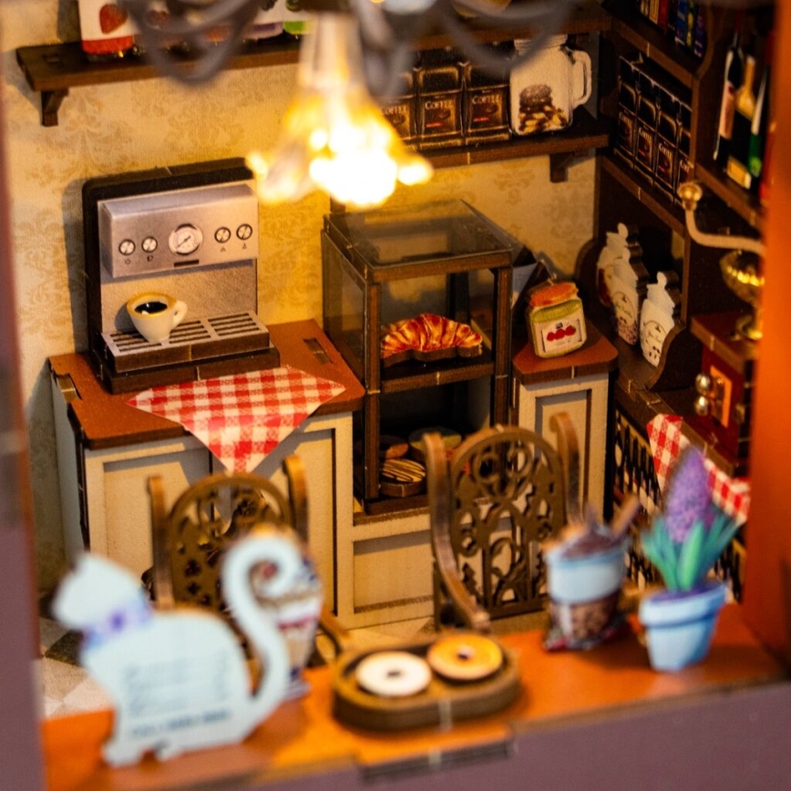 2Kids Toys - 3D puzle LED grāmatzīme Kafejnīca 2xAAA