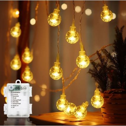 Aigostar - Āra LED Ziemassvētku virtene 100xLED/3xAA/8 režīmi 10,3 m IP44 siltā balta