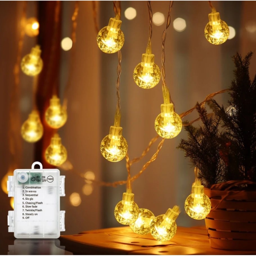 Aigostar - Āra LED Ziemassvētku virtene 100xLED/3xAA/8 režīmi 10,3 m IP44 siltā balta