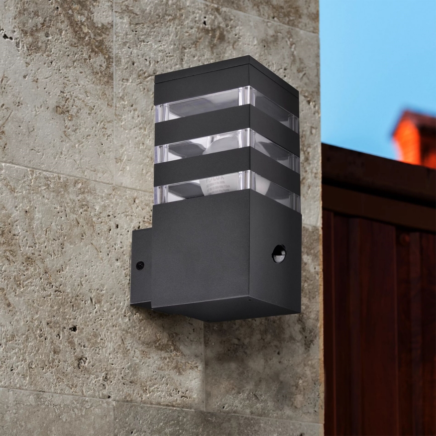Āra sienas lampa ar sensoru TEKSAS 1xE27/12W/230V IP44 antracīta