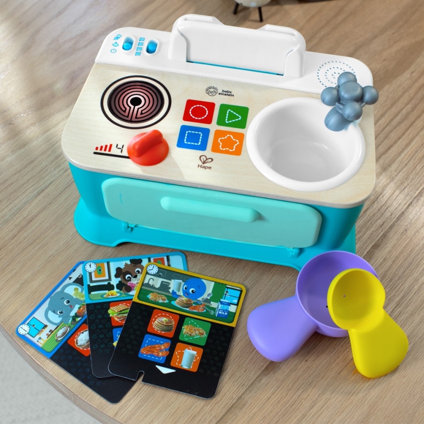 Baby Einstein - mūzikas rotaļlieta MAGIC TOUCH virtuvīte, darbināma ar 3xAA baterijām