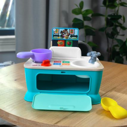 Baby Einstein - mūzikas rotaļlieta MAGIC TOUCH virtuvīte, darbināma ar 3xAA baterijām