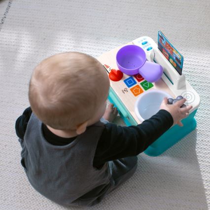 Baby Einstein - mūzikas rotaļlieta MAGIC TOUCH virtuvīte, darbināma ar 3xAA baterijām