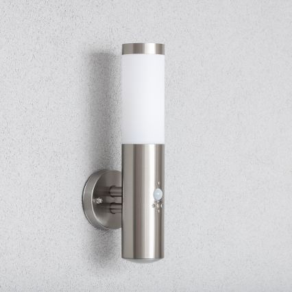 BRILAGI - Āra sienas lampa ar kustības sensoru ELIA 1xE27/20W/230V IP44 matēts hroms