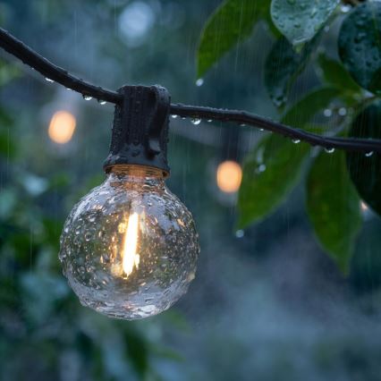 Brilagi - LED āra dekoratīva virtene GIRLANDA 25xE12/0,6W/230V 20m melna IP44 silti balta + tālvadības pults