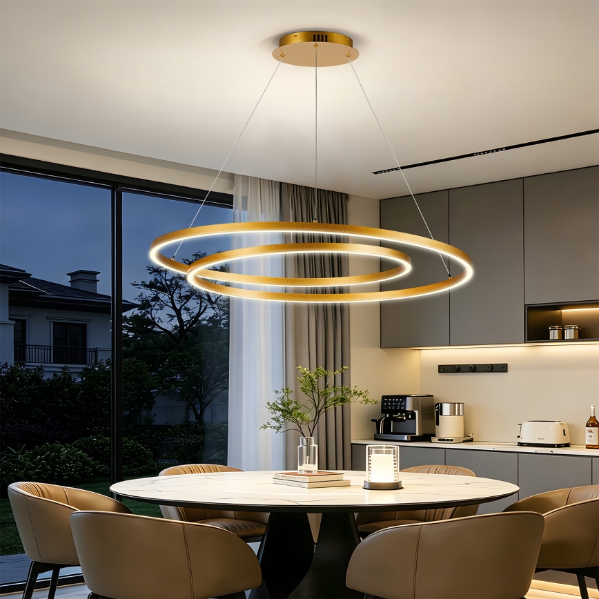 BRILAGI - regulējama LED lustra uz troses TWISTER, LED 105 W, 230 V, 3000–6000 K, Ø 100 cm, zelta krāsa + tālvadības pults