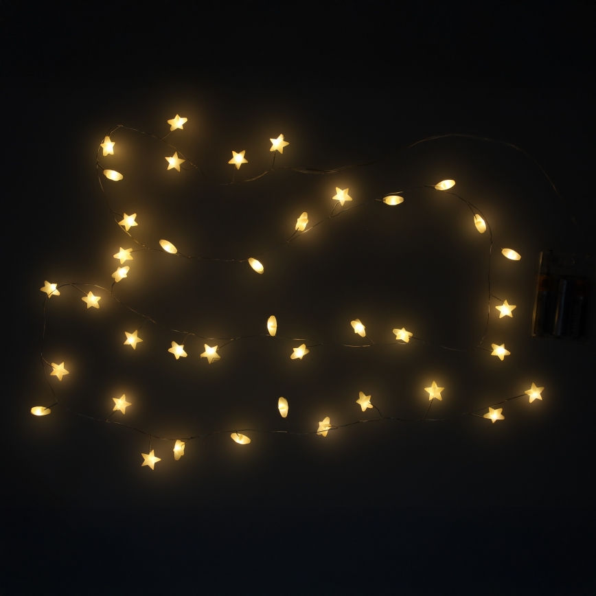 Brilagi - LED virtene 40xLED/3xAA 1,8m silti balta zvaigznes