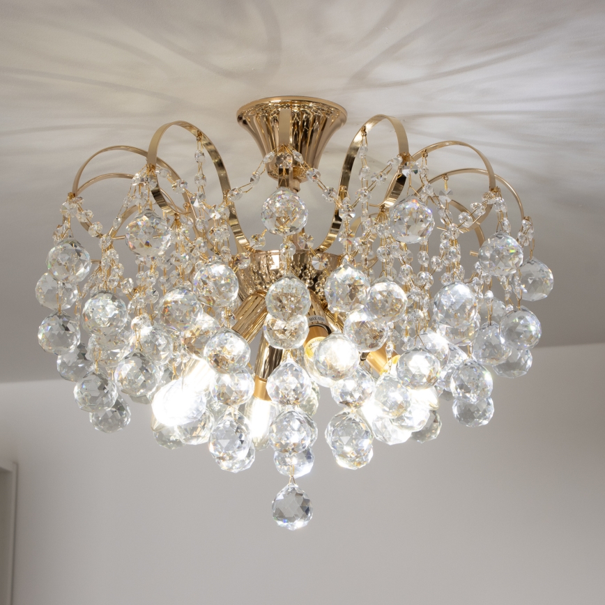 Brilagi - Virsapmetuma lustra CRYSTAL 6xE14/60W/230V zelta