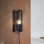 Brilliant - Sienas lampa MAZE 1xE27/40W/230V melna