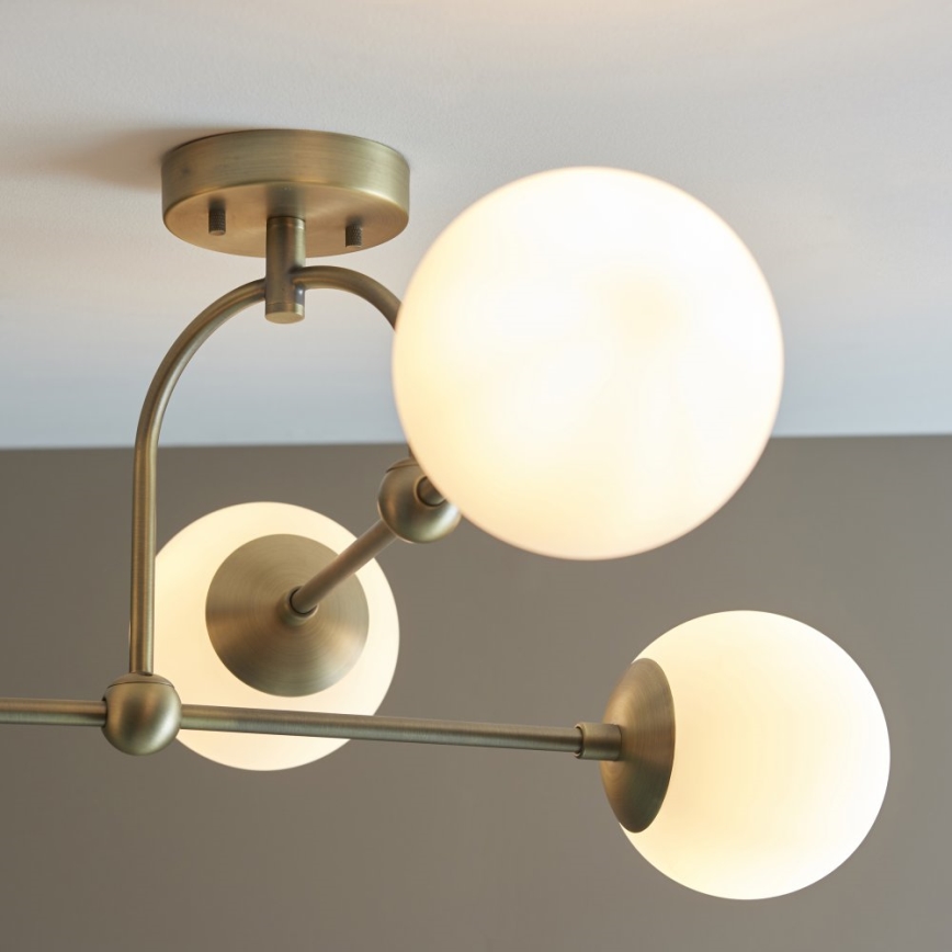 Endon 90843 - Virsmas montējamā griestu lustra ONTARIO 4xE14/7W/230V, misiņš