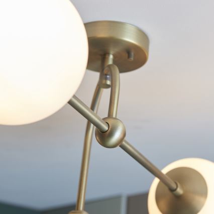Endon 90843 - Virsmas montējamā griestu lustra ONTARIO 4xE14/7W/230V, misiņš