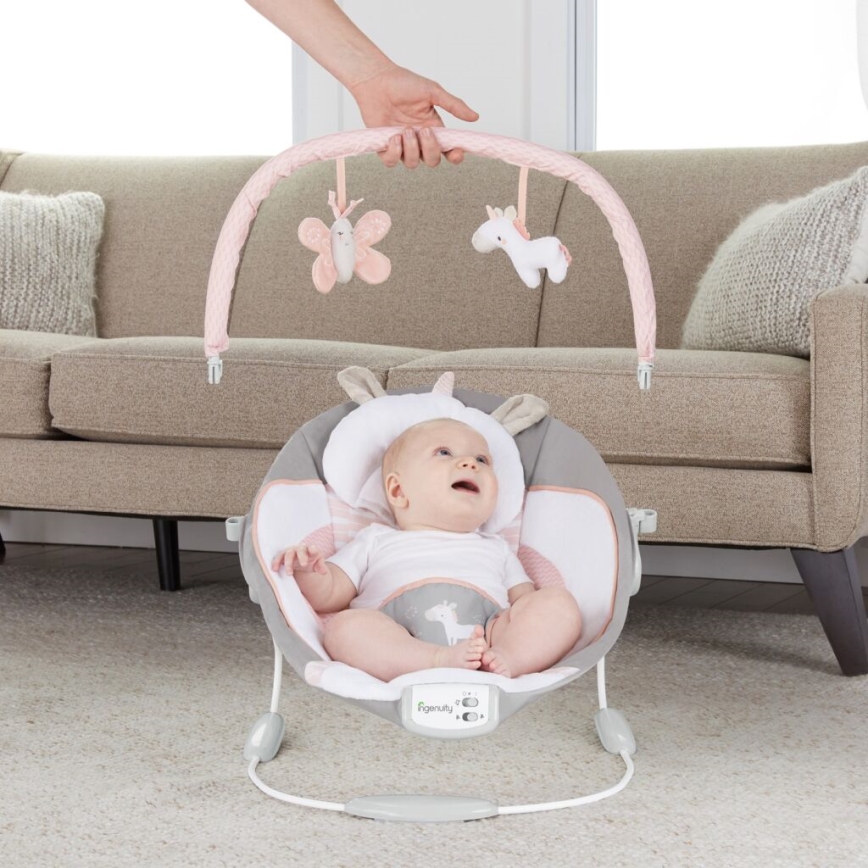 Ingenuity - Bērnu kustīgs guļamkrēsls ar mūziku FLORA THE UNICORN 3xC