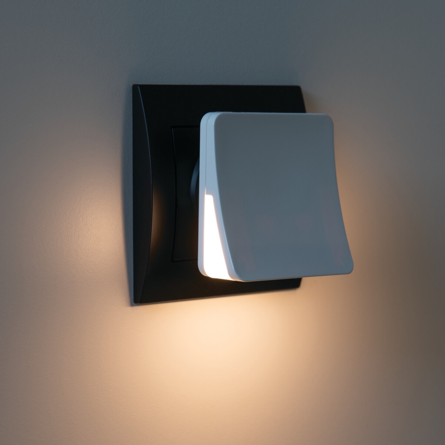 LED orientējošais gaismeklis ar krēslas sensoru kontaktligzdai HOFI LED/0,28W/230V balts
