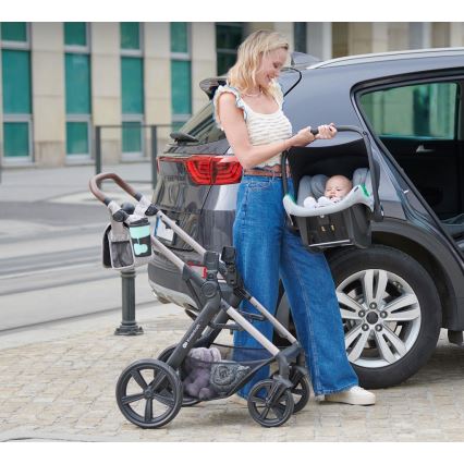 KINDERKRAFT - kombinētie ratiņi 3in1 MOOV 2 Sand bēša + autokrēsls MINK PRO