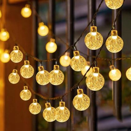 LED saules dekoratīvā virtene 50xLED/8 funkcijas 500 mAh 9,5 m IP67 silti balta