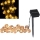 LED Saules enerģijas dekoratīva virtene BUBBLE GLASS 20xLED/8 funkcijas 4,85 m 600 mAh IP44 silti balta