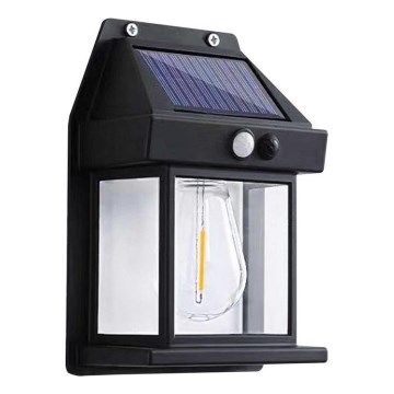 LED Saules enerģijas sienas lampa ar sensoru LANTER LED/1W/3,7V 1200 mAh IP44 melna