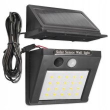 LED Saules enerģijas sienas lampa ar sensoru un ārējo paneli LED/0,55W/3,7V IP65