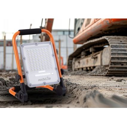 Uzlādējamais LED prožektors ar statīvu un regulējamu spilgtumu LED/100W/3,2V 4500K 10000 mAh IP65 oranžs