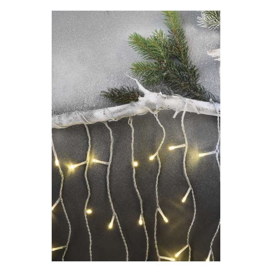 LED Ziemassvētku āra virtene 300xLED/8 režīmi 10m IP44 silti balta + tālvadības pults