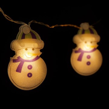 LED Ziemassvētku virtene 10xLED/2xAA 1,35 m silti balts sniegavīrs