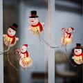 LED Ziemassvētku virtene ar piesūcekņiem 6xLED/2xAA 1,2m silti balta sniegavīrs