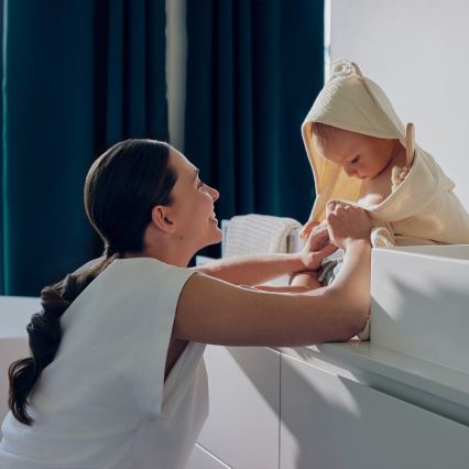 Lionelo - Bērnu muslīnas dvielis ar kapuci, bēšs kapučīno