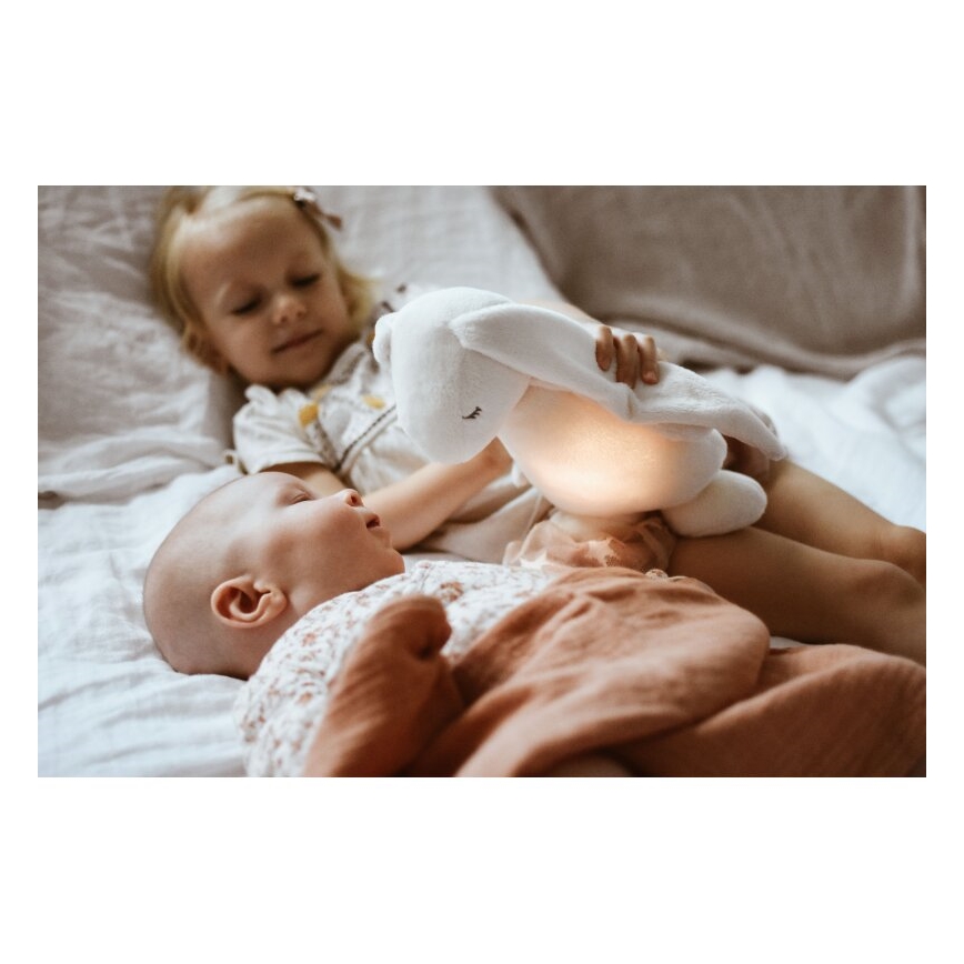 Moonie - Mīļmantiņa ar melodiju un lampu 2.0 zaķītis organic roze