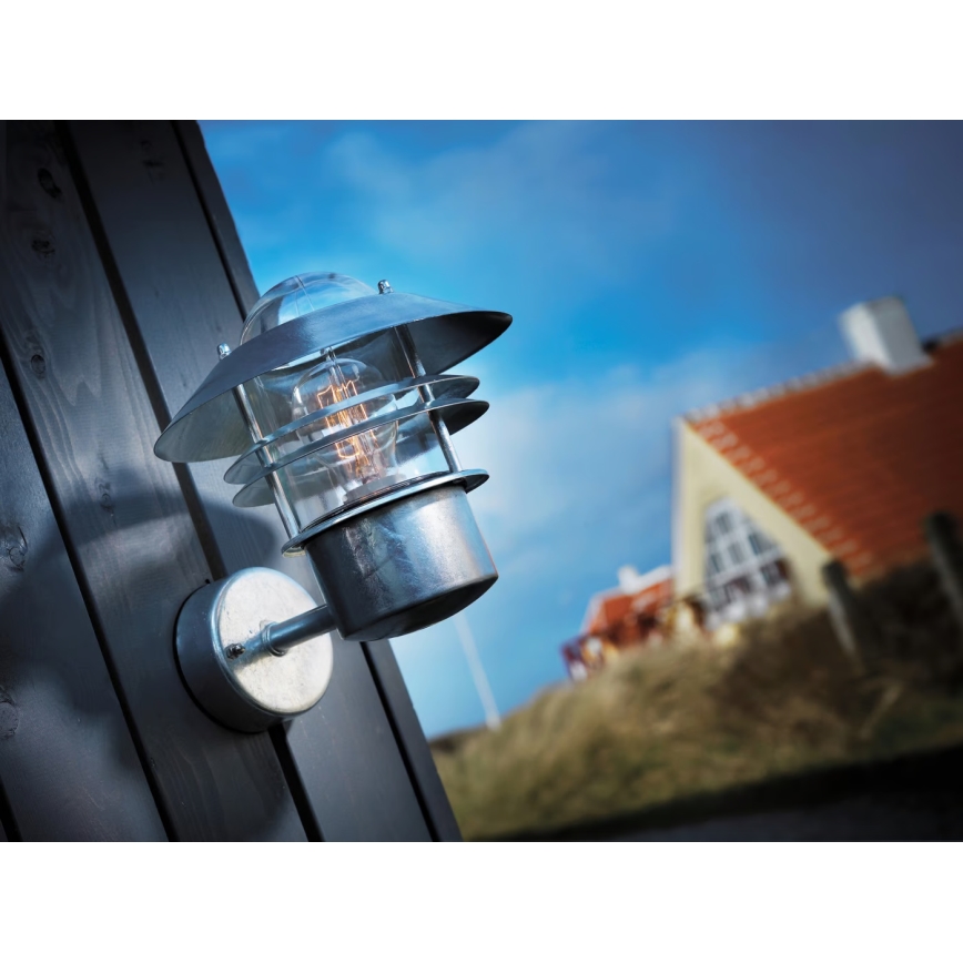 Nordlux - Āra sienas lampa BLOKHUS 1xE27/60W/230V IP54 sudraba