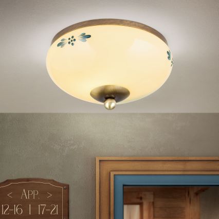 Griestu gaismeklis LANDHAUS 1xE27/60W/230V Ø 21 cm bronza/bēša/zila