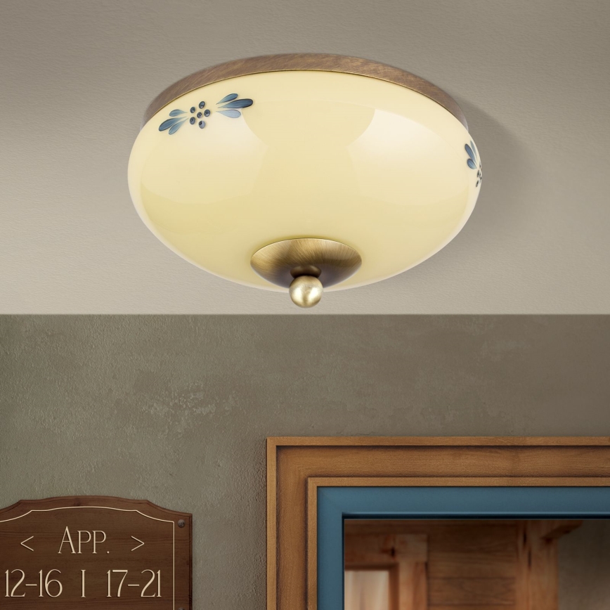 Griestu gaismeklis LANDHAUS 1xE27/60W/230V Ø 21 cm bronza/bēša/zila