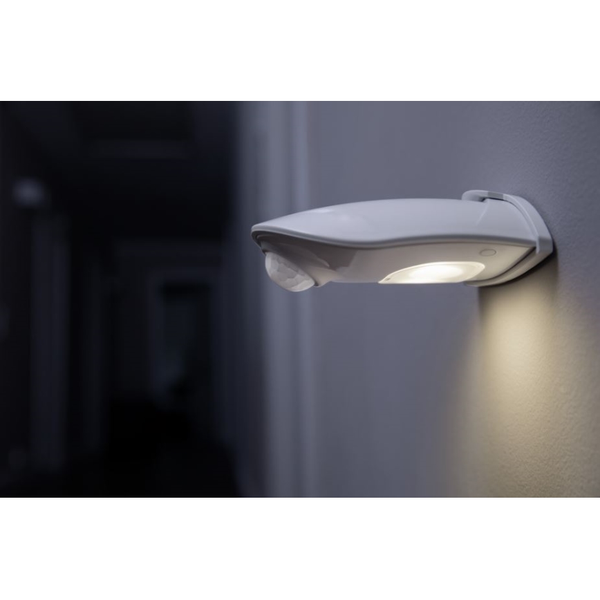 Osram - LED āra sienas gaismeklis ar sensoru DOORLED LED/0,5W/3xAA IP54 balts