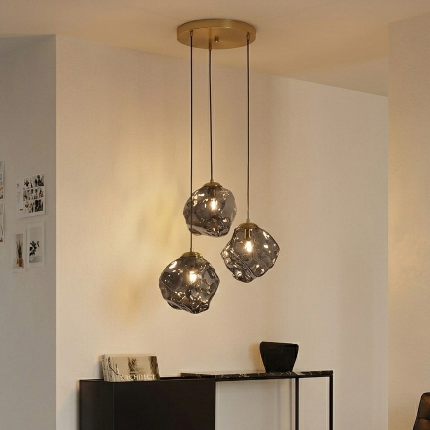 Pakaramā lustra ar trosi CRISTAL 3xE14/15W/230V misiņš/dūmakaini melna