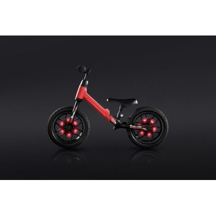 QPlay - Skrejritenis ar LED lampas uz ritentiņiem SPARK sarkana