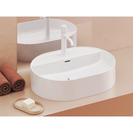 Ravak XJX01155003 - Uz virsmas uzstādāma izlietne CERAMIC SLIM 55x40 cm keramika/balta