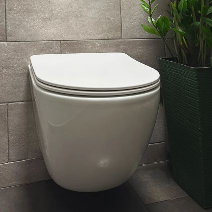 REA-C1259 - Pakarināms WC ar tualetes sēdekli CARLO MINI TORNADO RIMLESS keramika/spīdīgi balta