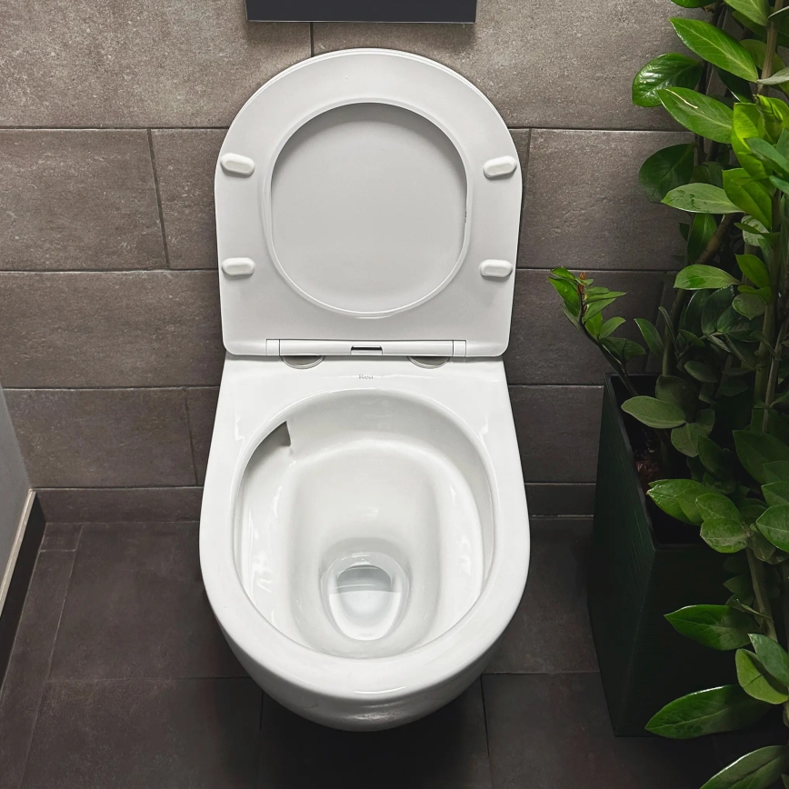 REA-C1259 - Pakarināms WC ar tualetes sēdekli CARLO MINI TORNADO RIMLESS keramika/spīdīgi balta