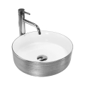 REA-U3304 - Virsmas uzliekama izlietne SAMI Ø 36 cm keramika/balta/sudraba