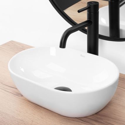 REA-U3322 - Uz virsmas novietojama izlietne AMELIA MINI 26x38 cm keramika/glancēta balta