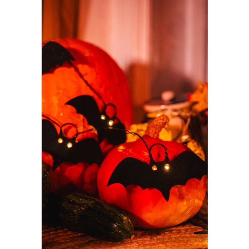 LED Dekoratīva virtene HALLOWEEN 10xLED/2xAA/silti balta 1,3m sikspārņi