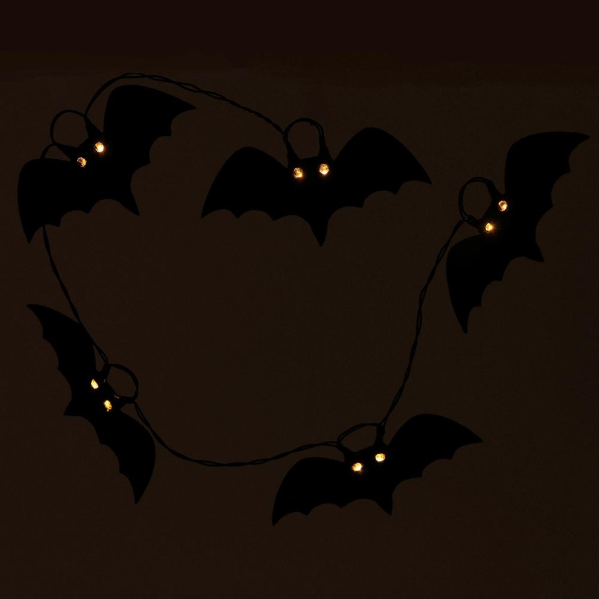 LED Dekoratīva virtene HALLOWEEN 10xLED/2xAA/silti balta 1,3m sikspārņi