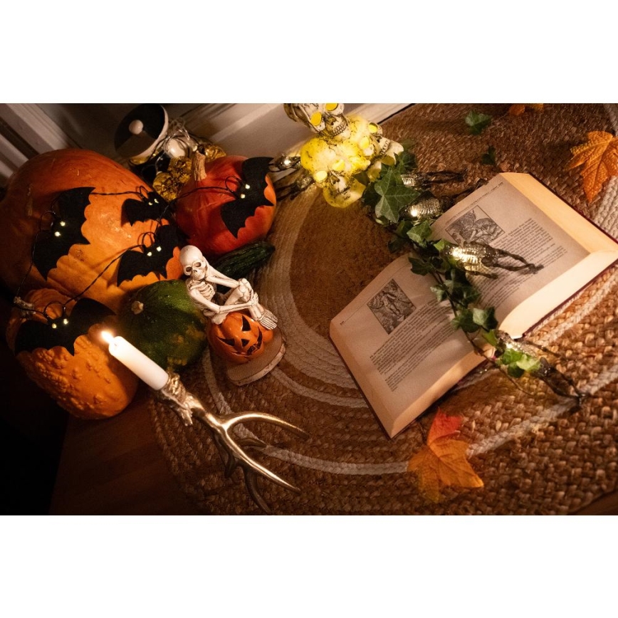 LED Dekoratīva virtene HALLOWEEN 10xLED/2xAA/silti balta 1,3m sikspārņi