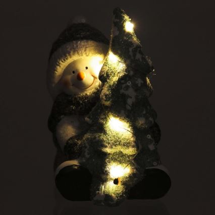 LED Ziemassvētku rotājums LED/2xLR44/silti balta sniegavīrs ar koku