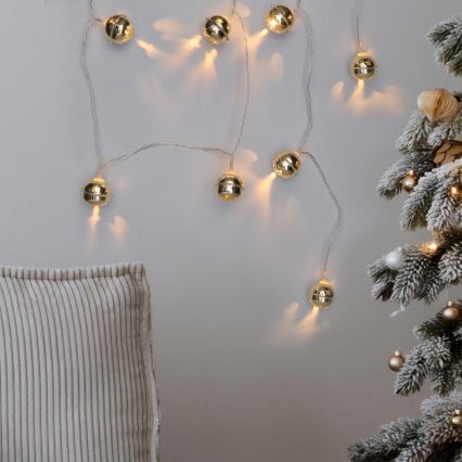 LED Ziemassvētku virtene 10xLED/2xAA/silti balta 1,8m zvaniņi