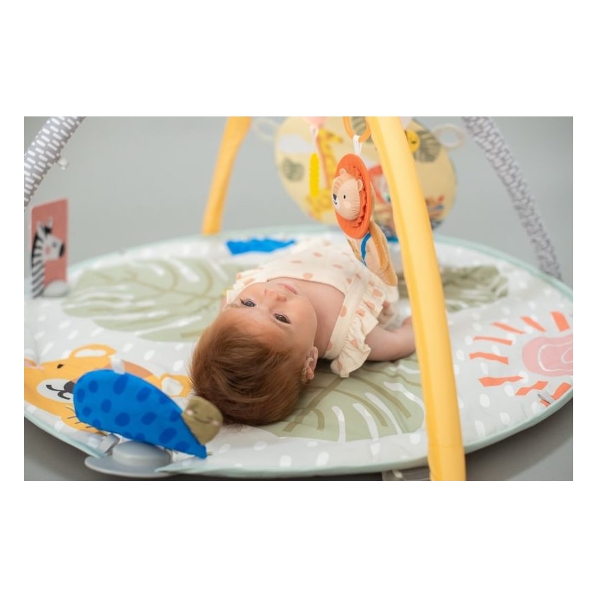 Taf Toys - Bērnu rotaļu paklājiņš ar arku savanna 2xAAA