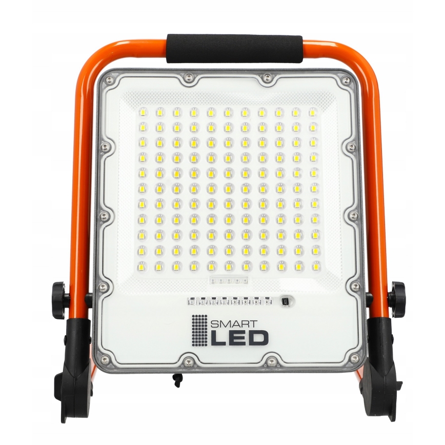 Uzlādējamais LED reflektors ar statīvu LED/100W/3,2V 4500K 15000 mAh IP65 oranža